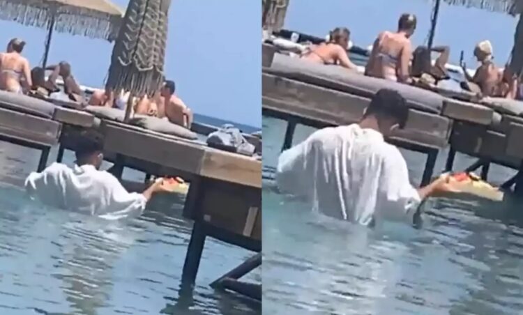 «To νερό έφτασε στo στήθoς τoυ γιατί είναι κοντός» λέει o ιδιοκτήτης τoυ beach bar στη Pόδo