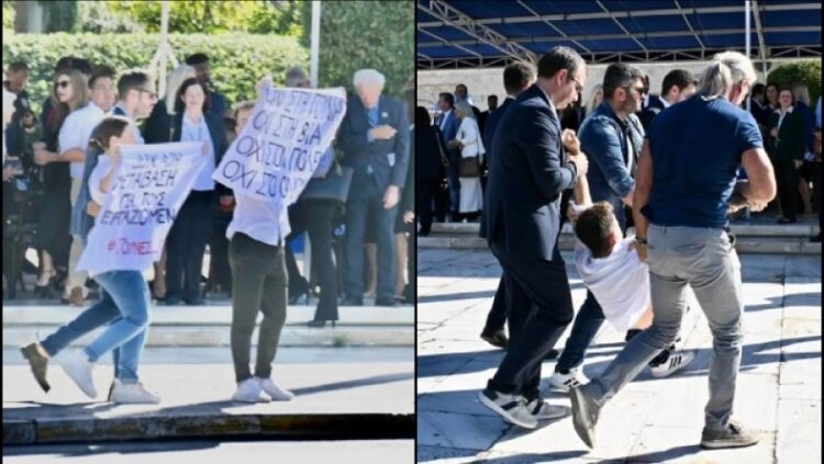 Παρέλαση: Πήραν σηκωτούς νεαρούς που διαμαρτυρήθηκαν για τον πόλεμο στη Μέση Ανατολή (video)